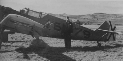 Me109-D1-3.J88-(6x79)-WrkN0655-Named-'Luchs'-(Lynx)-3rd-Staffel-Mickey-Mouse-Emblem-Flown-By-Oberleutnant-Werner-'Vati'-Molders-with-Mechanic-In-Front-Of-Aircraft-Spain-July-15-1938-Before-1st-Victory-184less1f-s.jpg