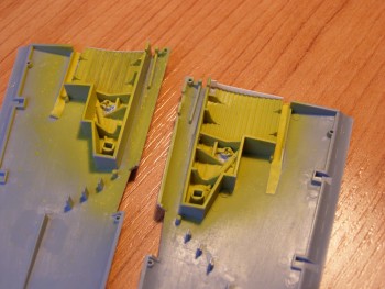 úprava v přechodu podv. šachty do trupu.